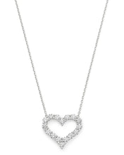 14K gold heart-shaped diamond necklace with sparkling pavé-set diamonds, elegantly crafted for timeless beauty.