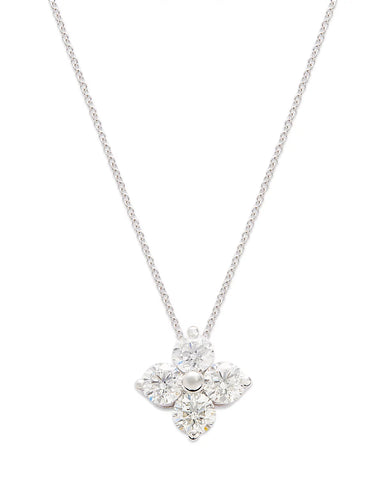 A stunning 14K gold diamond cluster pendant necklace featuring ethically sourced diamonds in a floral design, suspended on a delicate gold chain.