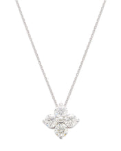 A stunning 14K gold diamond cluster pendant necklace featuring ethically sourced diamonds in a floral design, suspended on a delicate gold chain.