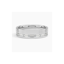 Men’s 14K gold eternity band with channel-set baguette diamonds. A modern and sophisticated wedding or anniversary ring with a timeless luxury appeal.