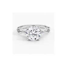 14K white gold diamond ring with twisted band design, oval-cut lab-grown diamond, and pavé-set accent stones. Elegant bridal and fine jewelry.
