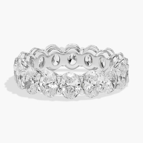 14K white gold oval lab diamond eternity ring on model’s hand