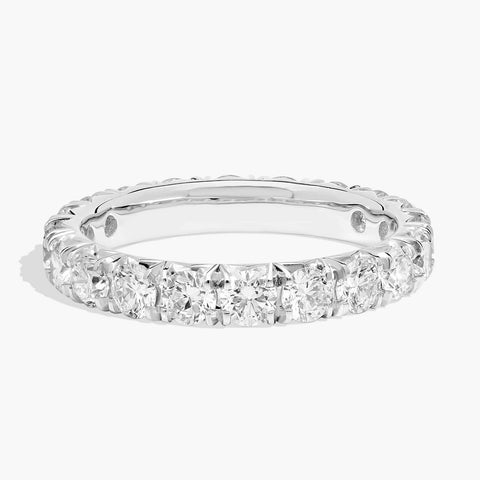 14K gold lab-grown diamond eternity ring with of round brilliant stones in a full pavé setting