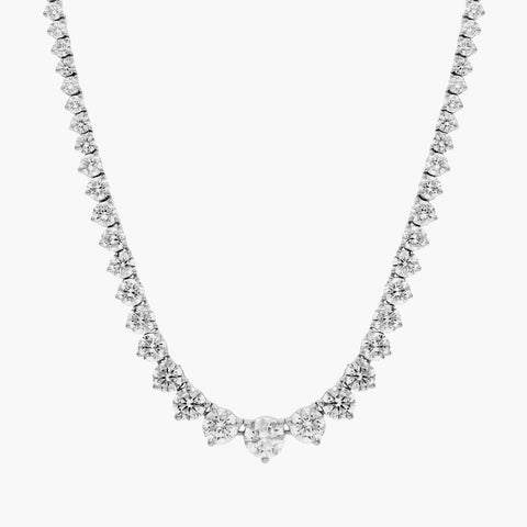 Close-up and model view of a 14K gold graduated diamond tennis necklace featuring round brilliant lab-grown diamonds in a classic prong setting.


