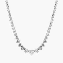 Close-up and model view of a 14K gold graduated diamond tennis necklace featuring round brilliant lab-grown diamonds in a classic prong setting.


