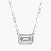 14K gold necklace featuring an emerald-cut lab-grown diamond pendant on a delicate chain