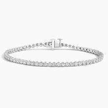 14K gold diamond tennis bracelet with lab-grown diamonds in a classic, elegant design. Available in White, Yellow, and Rose Gold.

