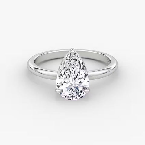 14K gold band with pear-cut lab-grown diamond in elegant solitaire setting

