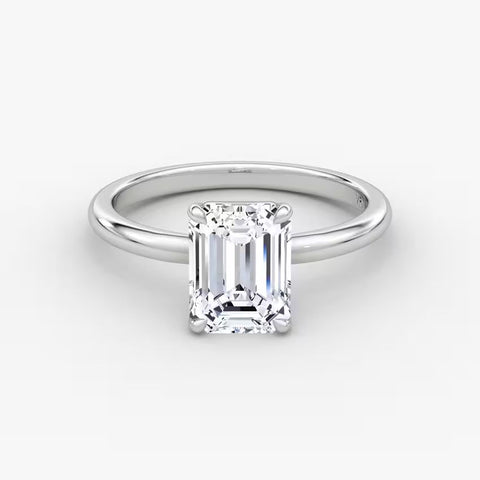 14K gold emerald-cut diamond band with center stone in a timeless setting